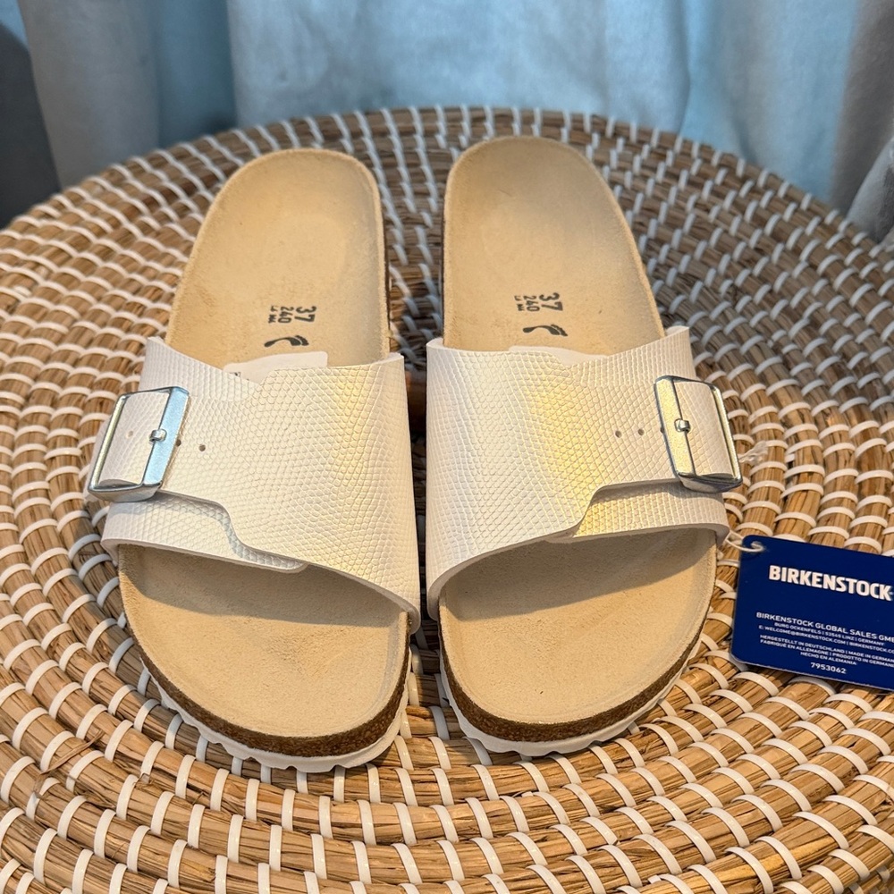 Birkenstock Cream Slide Sandals with Silver Buckle